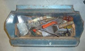 tool box full of tools, about 10 large files, bunch of screwdrivers, scrapers, etc
