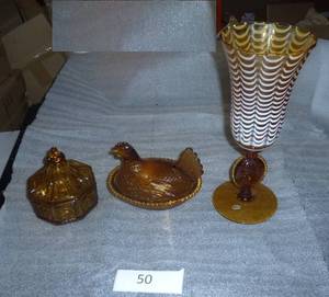 For you Amber glass collectors, nesting hen, octogon candy dish and a large striped vase with cameo at the base