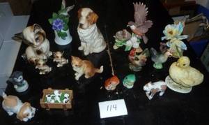 Group of porcelain and ceramic Animal figurines, cats dogs birds and even frogs
