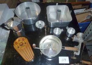 vintage kitchen stuff, angel food cake pans, one square and one round, tin cups, flour sifter, grinder, knife rack and tea pot
