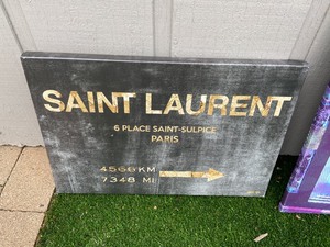 Pair of Faux Louis Vuitton & Yves Saint Laurent Canvas Prints