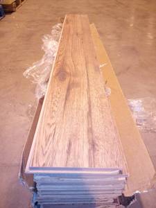 Distressed Brown Hickory 12 mm Thick x 6-14 in. Wide x 50-2532 in. Length Laminate Flooring (30 Sq Ft)