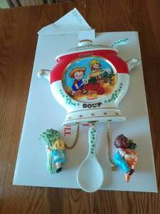 lot 113 image: Campbells Wall Clock and Two Trivets