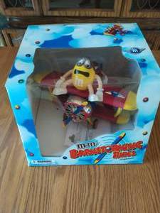 lot 121 image: M&Ms Barnstorming Rides Dispenser