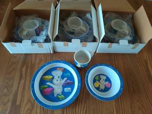 lot 146 image: Collection of 4 Pillsbury kids dinnerware sets