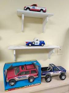 lot 183 image: Set of 4 Dinty Moore Trucks