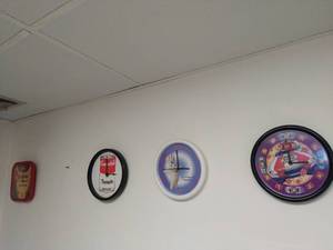 lot 39 image: Eight Promotional Clocks