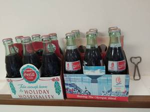 lot 45 image: Two Six Packs of Coca-Cola Bottles