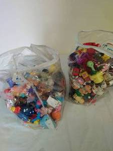 lot 69 image: Two Bags Full of Wind Up Toys