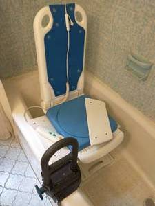 lot 276 image: Electric BathShower Chair, crutches, and grabber