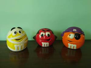 lot 203 image: Collection of M&M Canisters