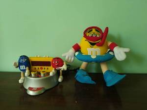 lot 210 image: M&M Alarm Clock and Stuffed Toy