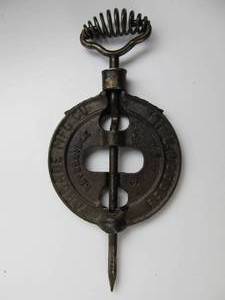 lot 11 image: U.S. Army WW2 Cast Iron Wood Stove Damper by Arcade Mfg.