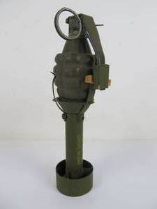 lot 44 image: Inert Hand Grenade w M1A2 Grenade Adapter for M16