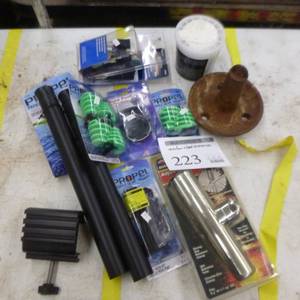 lot 223 image: Anchor and Boat Accessories (in original packaging)  with Paddle Gear, Trolling Motor Switch, Trailer Wiring Kit, Adjustable Clamp On Rod Holder, Scupper Stoppers, and more