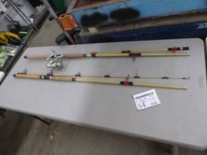 lot 54 image: Lot of (2) Berkley Glowstik Fishing Rods  - Silverado Reel (on one rod only)