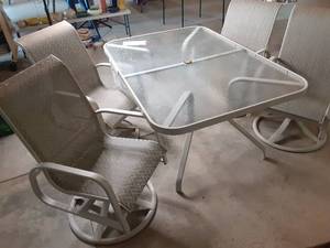 lot 135 image: Glass Top Patio Table With (4) Swiv...