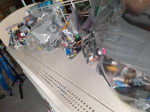 lot 137 image: Shelf of Bagged Legos (Pieces & Ac...