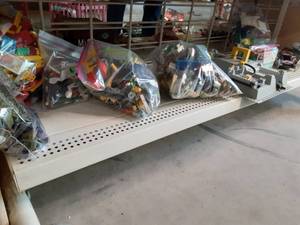 lot 140 image: Shelf of Bagged Legos (Pieces & Ac...
