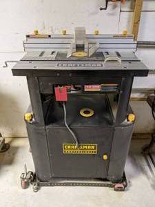 lot 13 image: Craftsman Professional Table Saw with Router and Cabinet Stand