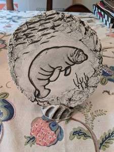 lot 133 image: Shapes of Clay Mt. St. Helens Ash Manatee Plaque