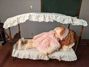 lot 252 image: Large Soft Doll with Wood Canopy Bed