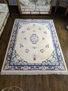 lot 417 image: 5.5 x 7.5 Traditional Cream Area Rug with Blue and Pink Details