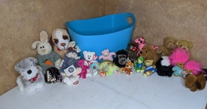 lot 423 image: Storage Tub Filled with Stuffed Animals Ty, Boyd, Hush Puppies, Trolls, etc.