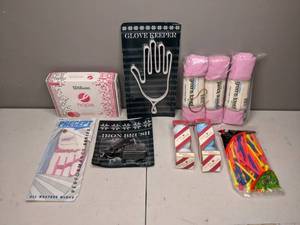 lot 366 image: Gone Golfing Golf Balls, Glove, Tees, Towels, etc.