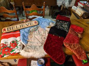 lot 192 image: Christmas Extravaganza Beaded Stockings, Large Santa Door Hanging, etc.