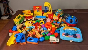 lot 263 image: Lot of Colorful Plastic and Wood Toys (Fisher Price, Tonka, etc.) in Storage Tub