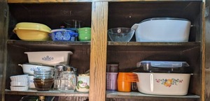 lot 601 image: Contents of Kitchen Cupboard Pyrex Baking Dishes, Measuring Cups & More