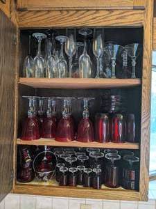 lot 607 image: Large Lot of Clear and Red Glass Stemware