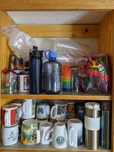 lot 716 image: Contents of Cupboard Coffee Mugs, Travel Tumblers, Plastic Cups