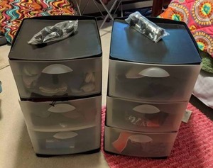 lot 586 image: (2) Plastic Storage Organizers Filled with Outerwear