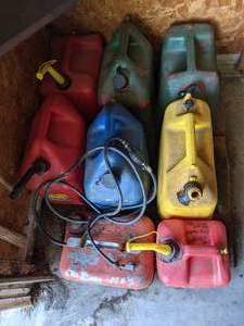 lot 596 image: Lot of Multi-Colored Gas Cans