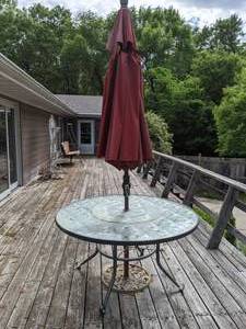 lot 779 image: Glass Patio Table with Umbrella