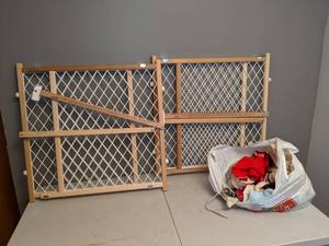 lot 821 image: (2) Baby Gates and Baby Clothes