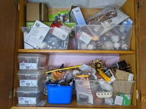 lot 804 image: Contents of Cupboard Light Bulbs, Batteries, etc.