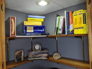 lot 809 image: Contents of Shelves Reference Books, Magazines, Clock, Coasters, etc.
