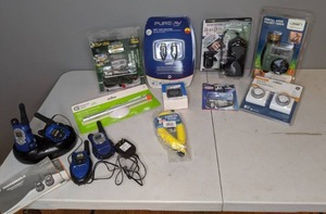 lot 814 image: Walkie Talkies, Facuet Timer, Battery Charger, etc.