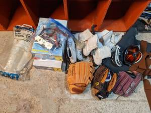 lot 863 image: Sporting Goods Ice Skates, Baseball Gloves, Shinguards, etc.