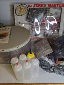 lot 791 image: Food Dehydrator, Condiment Bottles, Jerky Master Seasoning Kit, Silicone Molds