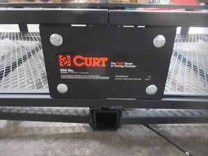 lot 201 image: Curt 500 lb. Capacity 60 in. x 24 in. Steel Basket Style Hitch Cargo Carrier for 2 in. Receiver 18153