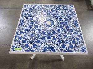 lot 212 image: Marivaux Blue and White Steel Outdoor Patio Dining Table 2166SB-1
