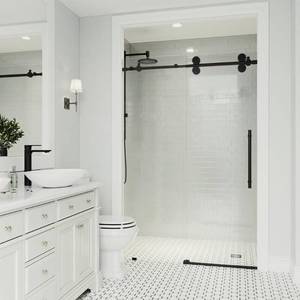 lot 82 image: VIGO Elan 52 to 56 in. x 74 in. Frameless Sliding Shower Door in Matte Black with Clear Glass and Handle, VG6041MBCL5674. Unclaimed.