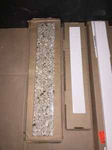 lot 10 image: ASSORTED COUNTERTOP SIDE SPLASHS. VARIOUS COLORS AND SIZES. SEE PICTURES
