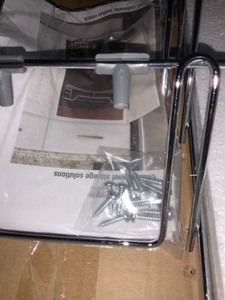 lot 44 image: DESIGNS TRENDS Pot and Pan Lid Organizer for Cabinet, 14 in. Sliding Pot and Lid Cookware Organizer, Chrome