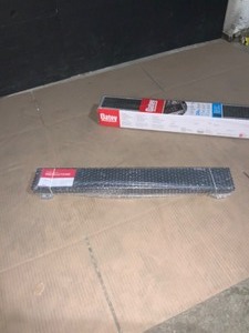 lot 58 image: OATLY Designline 24 in. Stainless Steel Linear Shower Drain with Square Pattern Drain Cover in Matte Black