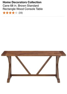 lot 32 image: HOME DECORATORS COLLECTION CANE 68 IN. BROWN STANDARD RECTANGLE WOOD CONSOLE TABLE. SEE PICTURES